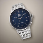 Reloj Análogo Hombre Orient Plateado RA-AC0J09L